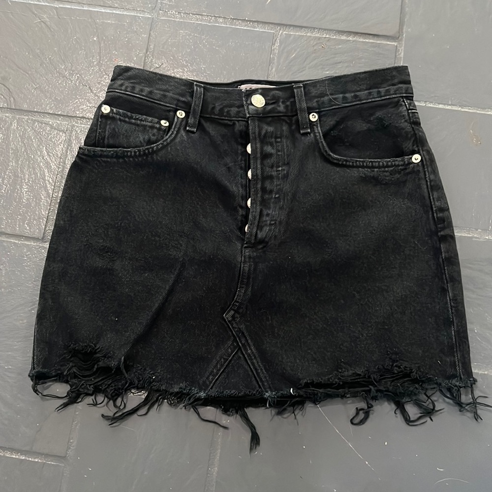 Black distressed jean skirt.